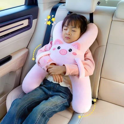 Child napping in the back seat hugging the Maado Road Trip Pillow in Pink Piggy